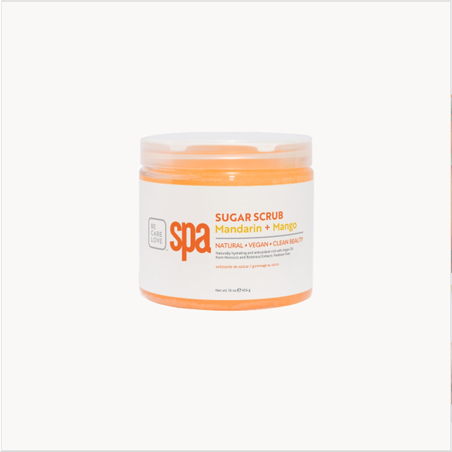 Citrus sugar scrub with mandarin, mango, and organic oils for radiant skin