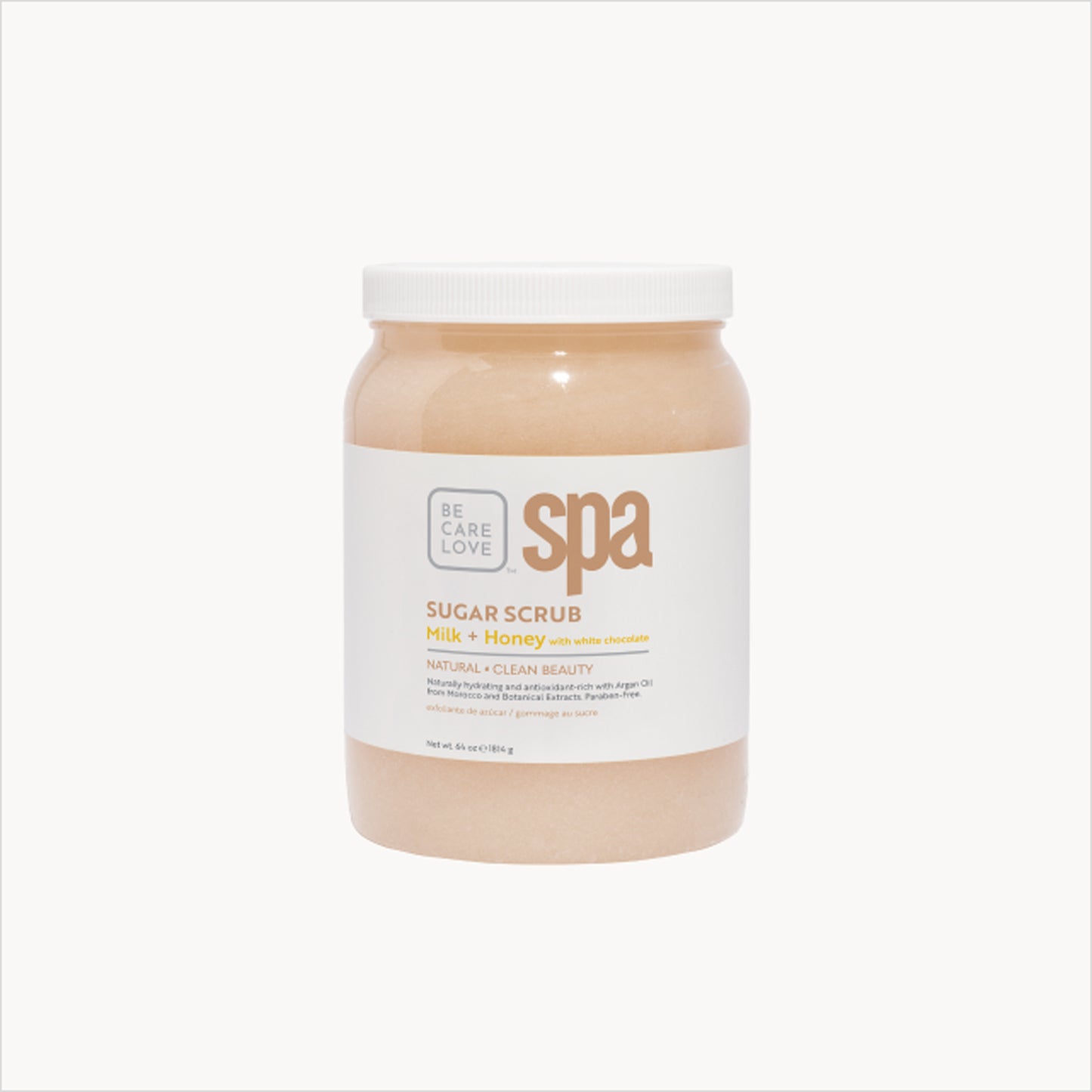 Creamy sugar scrub with milk, honey, and white chocolate for soft, hydrated skin