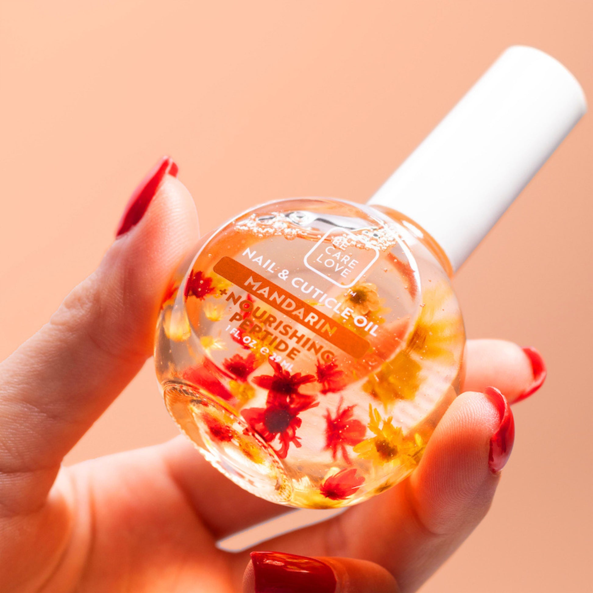 Hydrating nail and cuticle oil with mandarin and nourishing peptides