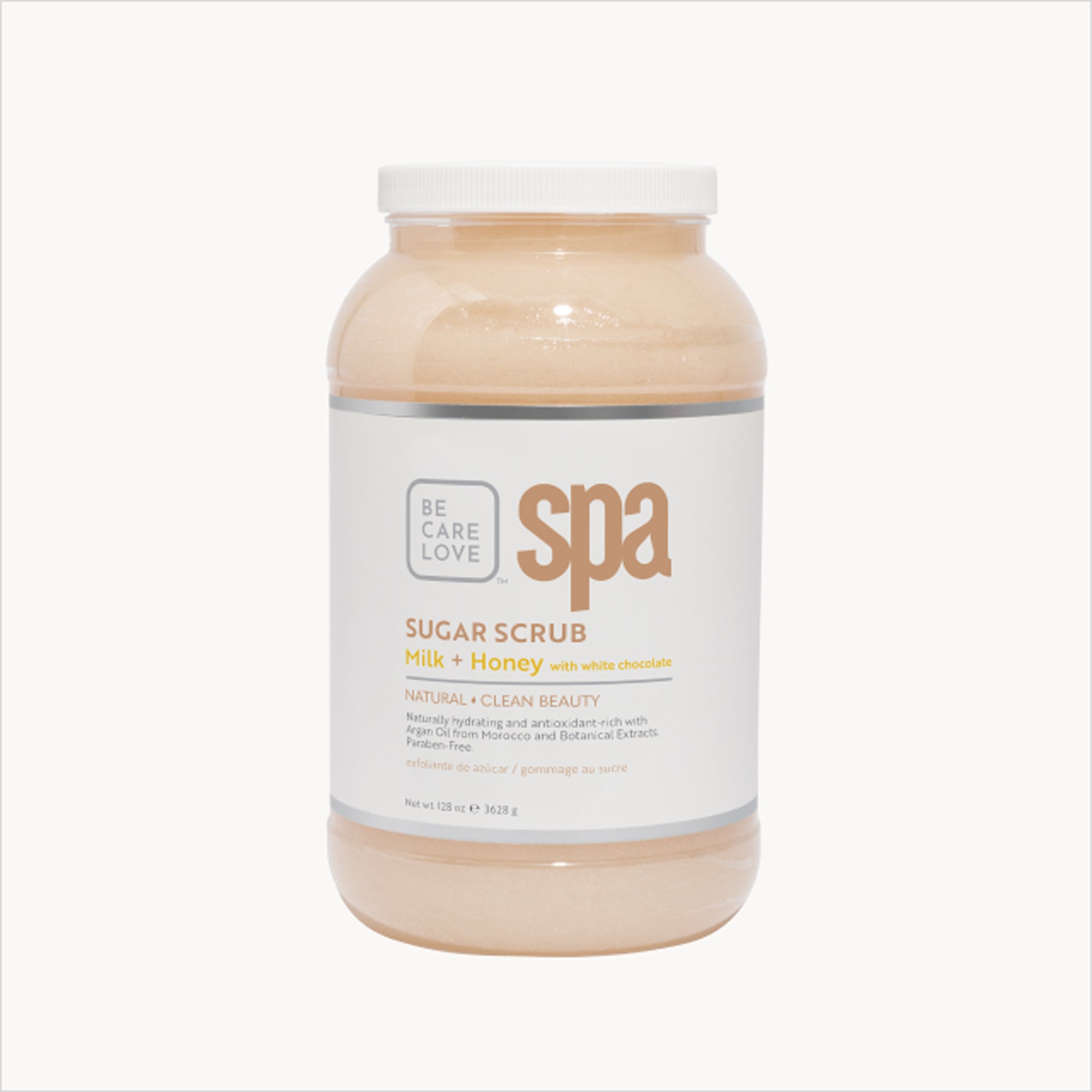 Creamy sugar scrub with milk, honey, and white chocolate for soft, hydrated skin